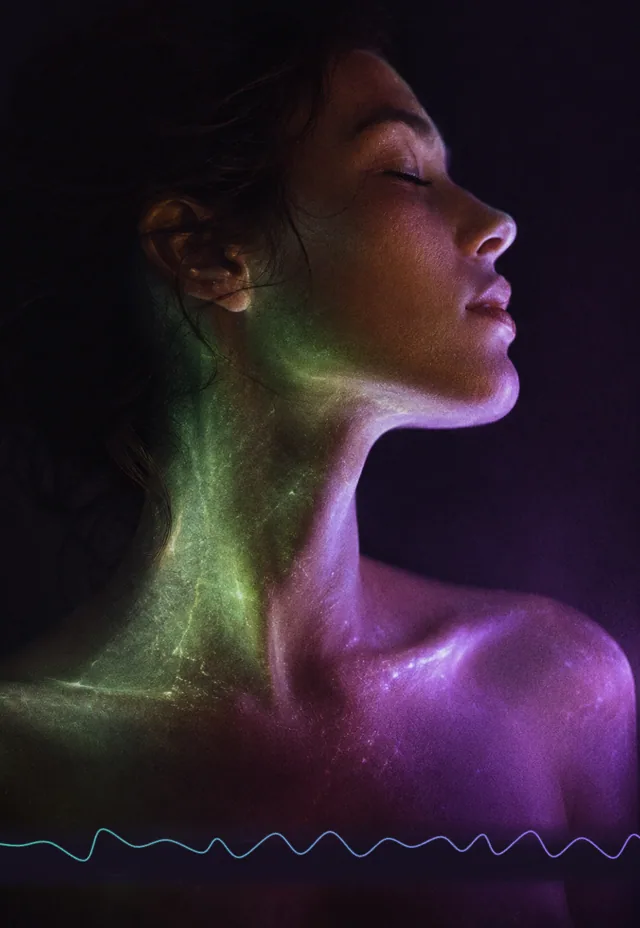 A face crossed by green and violet light — the signal made legible.